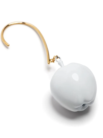 Shop Undercover Hook Apple Charm Earring In White
