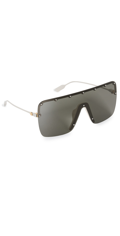 Shop Gucci Rimless Shield Mask Sunglasses In Gold-silver-grey