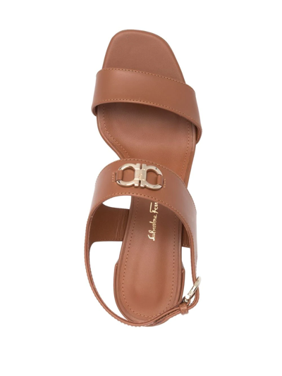 Shop Ferragamo Gancini-plaque Leather Sandals In Brown