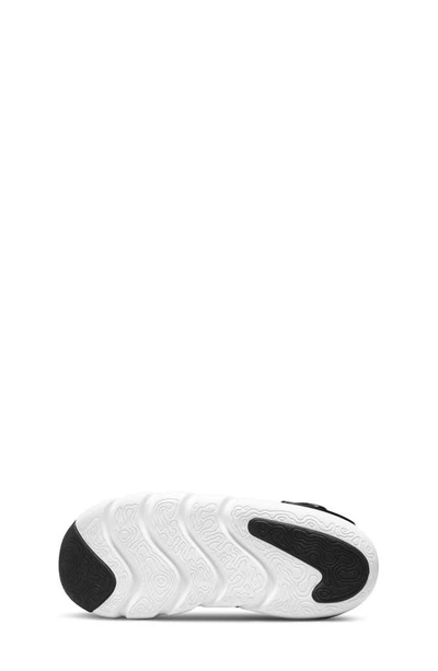 Shop Nike Kids' Dynamo Go Sneaker In Black/ White/ University Red