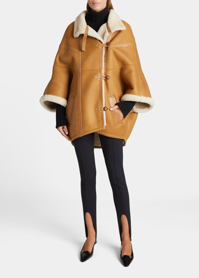 Shop Saint Laurent Oversized Leather Cape With Shearling Lining In Ecru Natur