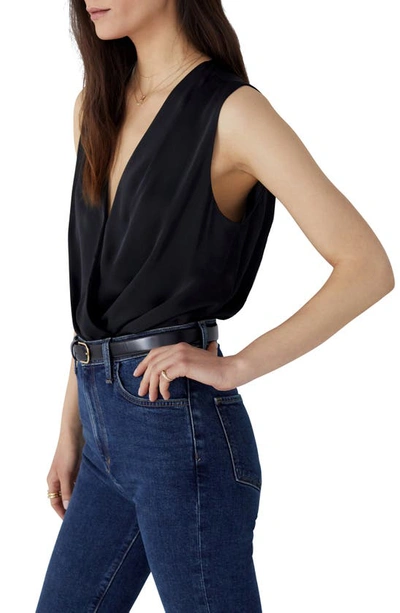 Shop Favorite Daughter The Date Sleeveless Wrap Blouse In Black