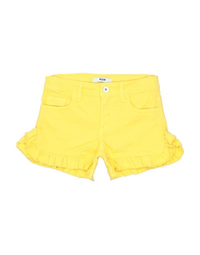 Shop Msgm Denim Shorts In Yellow