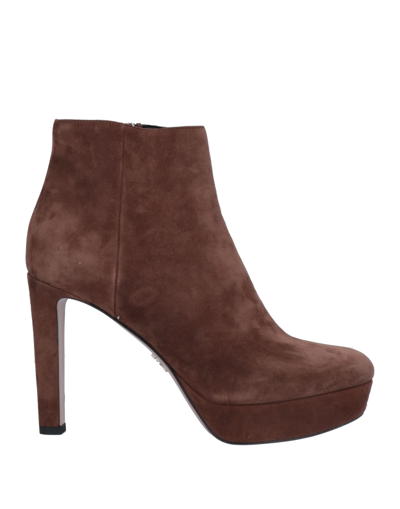 Shop Prada Ankle Boots In Brown