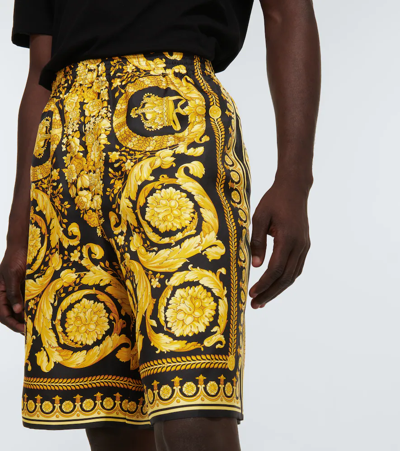 Shop Versace Printed Silk Shorts In Nero+oro