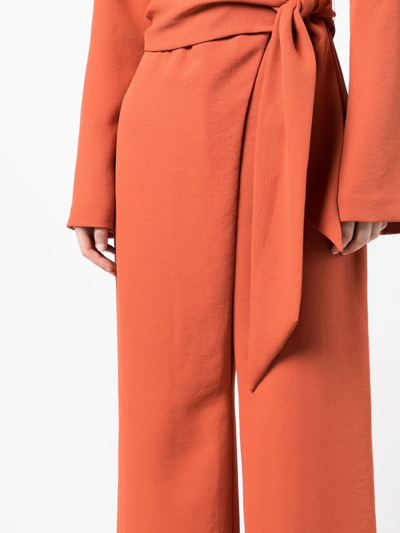 Shop Galvan Marina Tied-waist Jumpsuit In Orange