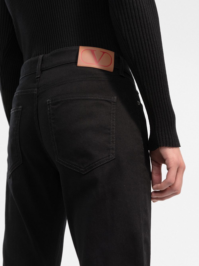 Shop Valentino Dark-wash Slim-fit Jeans In Black