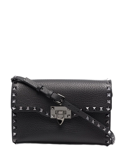 Shop Valentino Small Rockstud Leather Crossbody Bag In Black