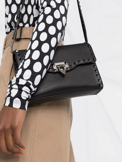 Valentino Garavani Grainy Calfskin Rockstud Flip Lock Flap Small Crossbody In Black