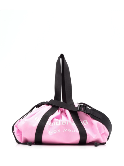 Shop Alexander Wang Logo-print Drawstring Duffle Bag In Pink