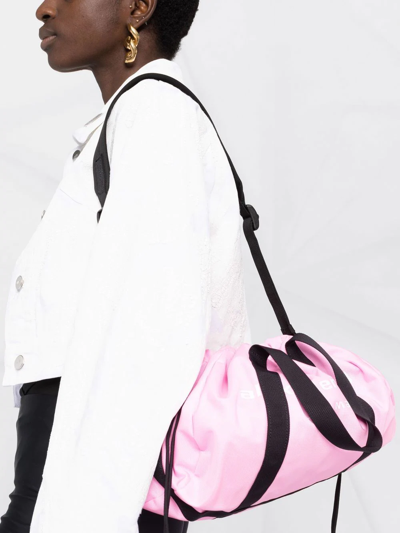 Shop Alexander Wang Logo-print Drawstring Duffle Bag In Pink