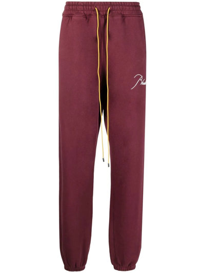 Shop Rhude Logo-embroidered Track Pants In Red