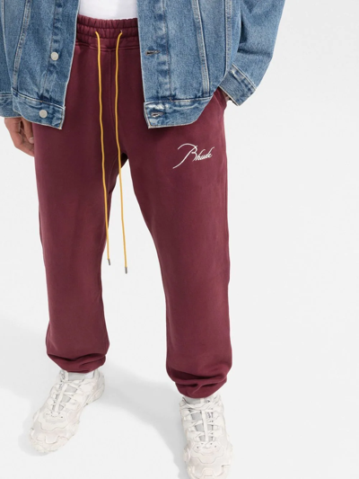 Shop Rhude Logo-embroidered Track Pants In Red
