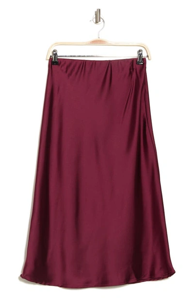 Shop Renee C Solid Satin Midi Skirt In Burgundy