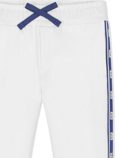 Shop Dolce & Gabbana Dg Logo-tape Track Trousers In White