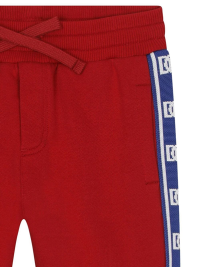 Shop Dolce & Gabbana Dg Logo-tape Track Trousers In Red