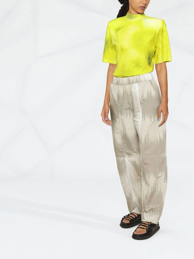 Ganni Curved Shell Trousers In Neutrals