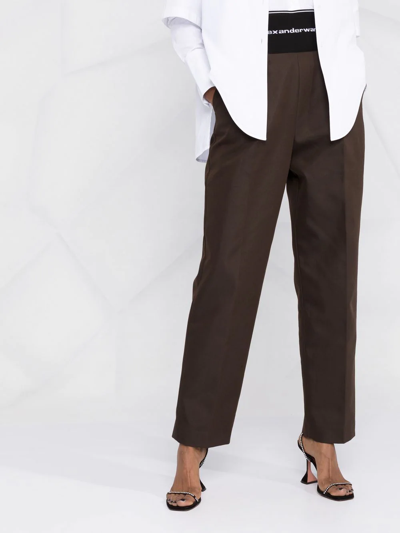 Shop Alexander Wang Logo-waistband Tailored Trousers In Braun
