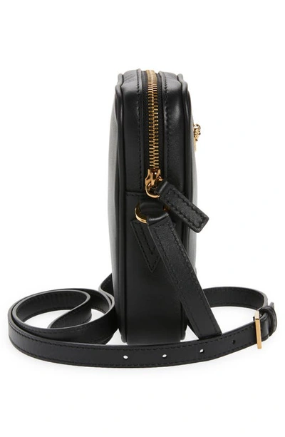 Shop Versace Biggie Medusa Coin Phone Crossbody Bag In Black/  Gold
