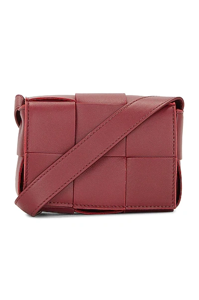 Shop Bottega Veneta Candy Cassette Crossbody Bag In Bordeaux & Gold