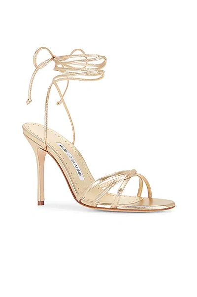 Shop Manolo Blahnik Leather Leva 105 Sandal In Gold