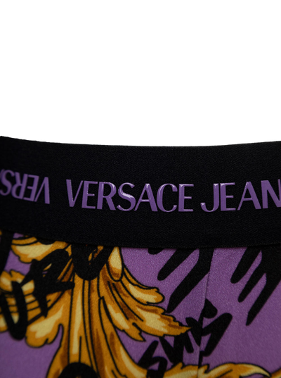 Shop Versace Jeans Couture Versae Jeans Couture Woman's  Stretch Fabric Leggings With Brush Logo Print In Violet