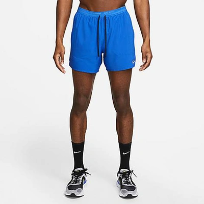 Shop Nike Men's Dri-fit Stride 5" Brief-lined Running Shorts In Game Royal/black/reflective Silver