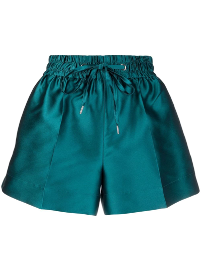 Shop Sandro Elasticated Satin Shorts In Green