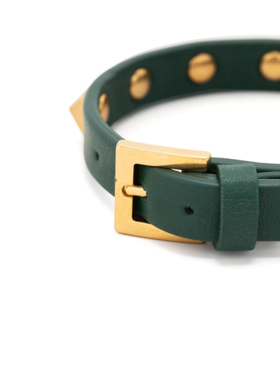 Shop Valentino Rockstud Embellished Bracelet In Green