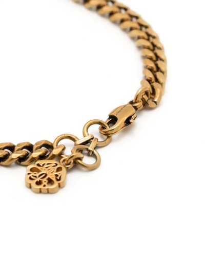 Shop Alexander Mcqueen Grafitti Logo Chain-link Bracelet In Gold