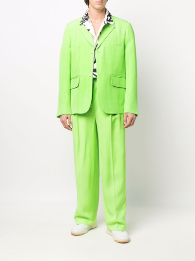 Shop Jacquemus Mela Viscose Trousers In Green