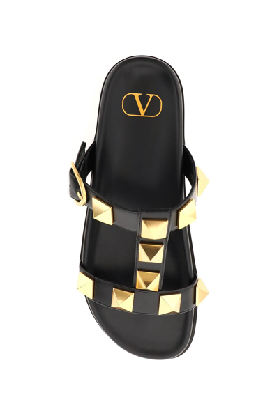 Shop Valentino Garavani Roman Stud Leather Mules In Black