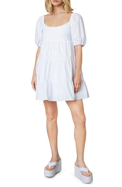 Shop Nia Silvana Tiered Ruffle Stretch Cotton Minidress In White