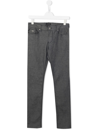 Shop Emporio Armani Logo-patch Slim-fit Jeans In Blue