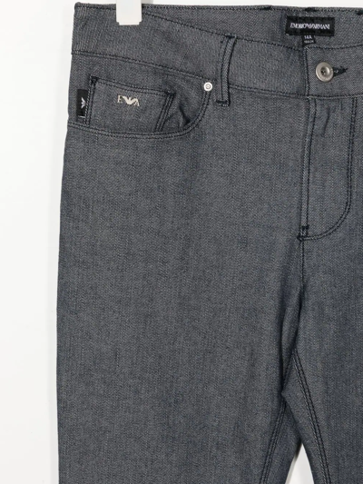 Shop Emporio Armani Logo-patch Slim-fit Jeans In Blue