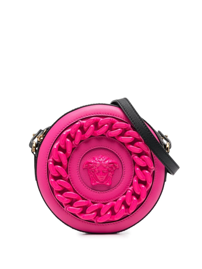 Shop Versace La Medusa Round Crossbody Bag In Pink