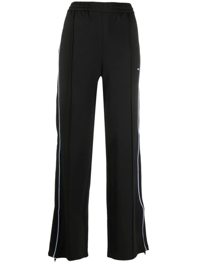 Shop Mcq By Alexander Mcqueen Logo-patch Track Pants In Black