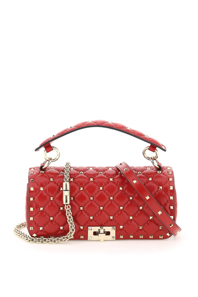Shop Valentino Garavani Rockstud Spike Handbag In Red