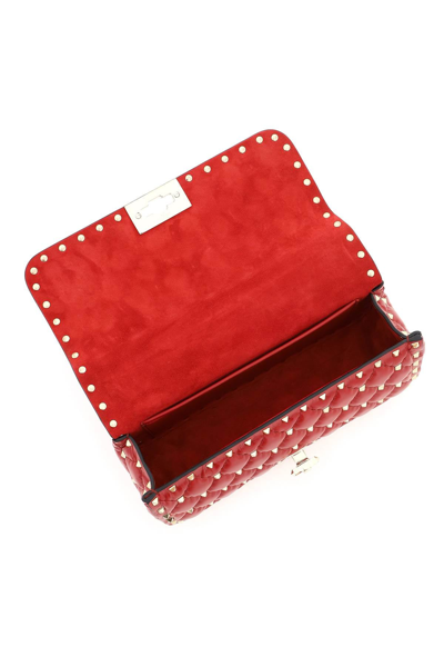 Shop Valentino Garavani Rockstud Spike Handbag In Red