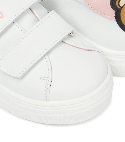 Shop Moschino Leather Sneakers In White/pink