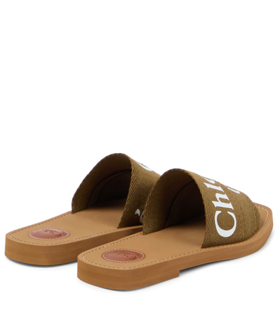 Shop Chloé Woody Canvas Slides In Grove Brown