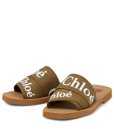 Shop Chloé Woody Canvas Slides In Grove Brown