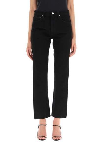 Shop Totême Toteme Denim Jeans With Twisted Seams In Black