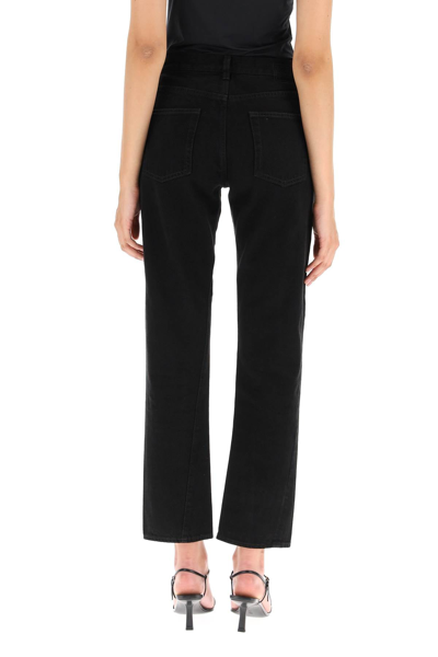 Shop Totême Toteme Denim Jeans With Twisted Seams In Black