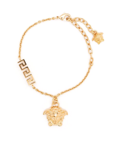 Shop Versace Medusa Pendant Bracelet In Gold