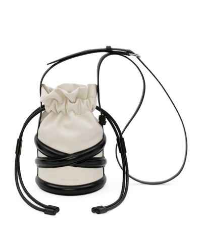 Shop Alexander Mcqueen Leather The Curve Drawstring Bucket Bag In Ivory