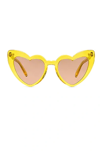Shop Saint Laurent Heart Sunglasses In Yellow