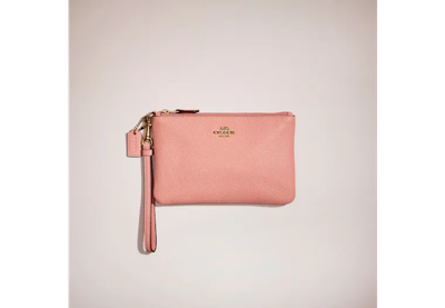 Shop Coach Restored Small Wristlet In Brass/candy Pink