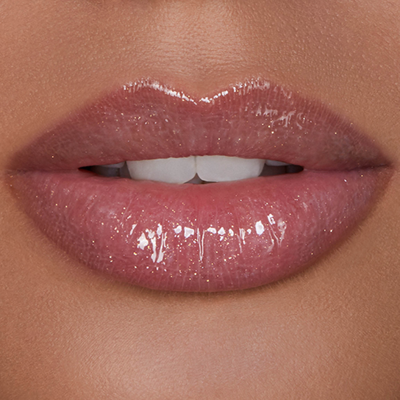 Shop Hourglass Unreal High Shine Volumizing Lip Gloss In Halo