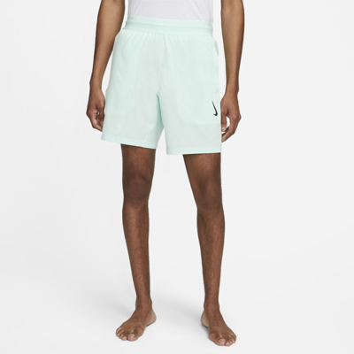 Shop Nike Yoga Dri-fit Men's Shorts In Mint Foam,black